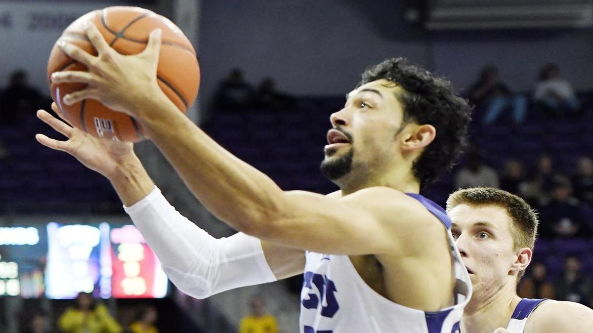 TCU guard and former Mansfield Timberview star Alex Robinson, left, and the undefeated Horned Frogs (8-0) go up against SMU on Wednesday in Dallas. The game will be televised at 7 p.m. on ESPNews.
