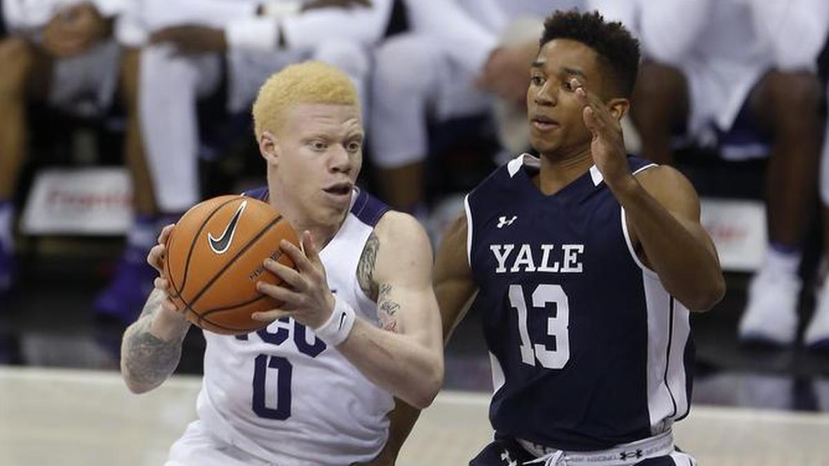 TCU guard Jaylen Fisher (0) drives against Yale guard Trey Phills (13) in the second half of the Frogs’ 92-66 win.