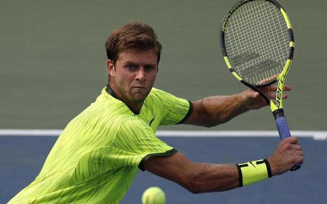 Ryan Harrison, of the United States, returns a shot to Milos Raonic, of Canada, during the second round of the U.S. Open tennis tournament last year. Harrison has reached the singles final of the RBC Tennis Championships of Dallas.