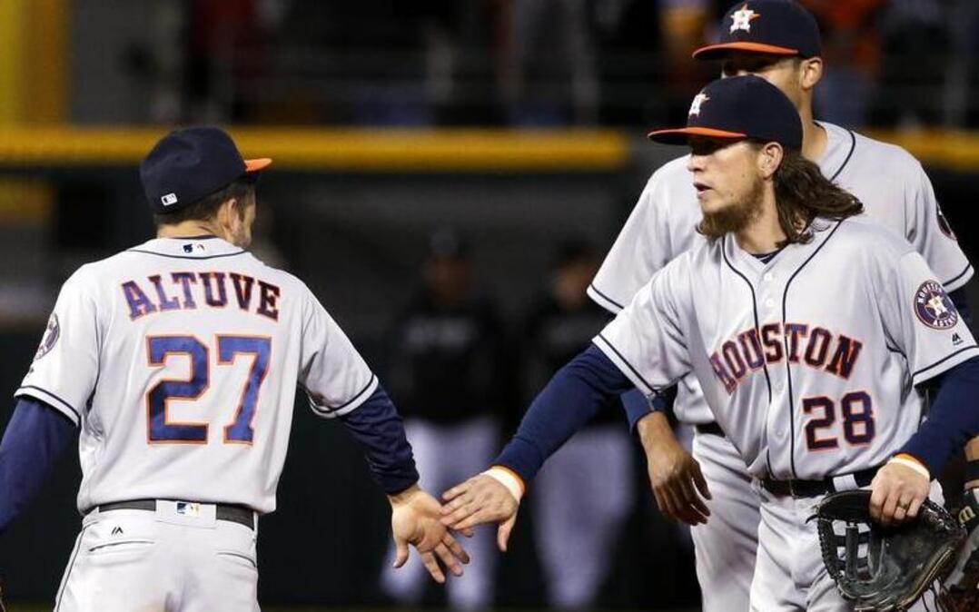 Houston Astros second baseman Jose Altuve, left, and outfielder Colby Rasmus celebrate after an Astros win. The Astros host the Texas Rangers at 7:10 p.m. Friday on FSSW.