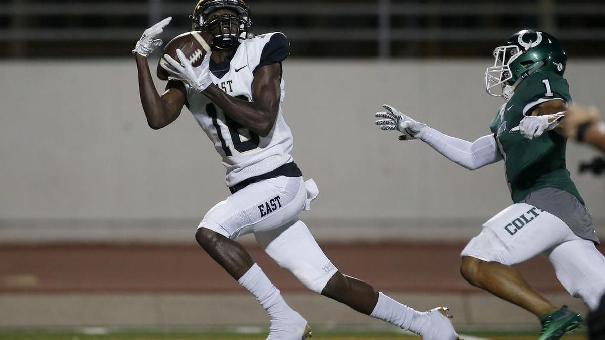 Plano East Panthers wide receiver Jaelen Anderson (16) grabs a touchdown reception past Arlington Colts cornerback Darien Ruffin (1) during the first half of a high school football game at UTA Maverick Stadium in Arlington, Texas on Friday, Sept 15, 2017.