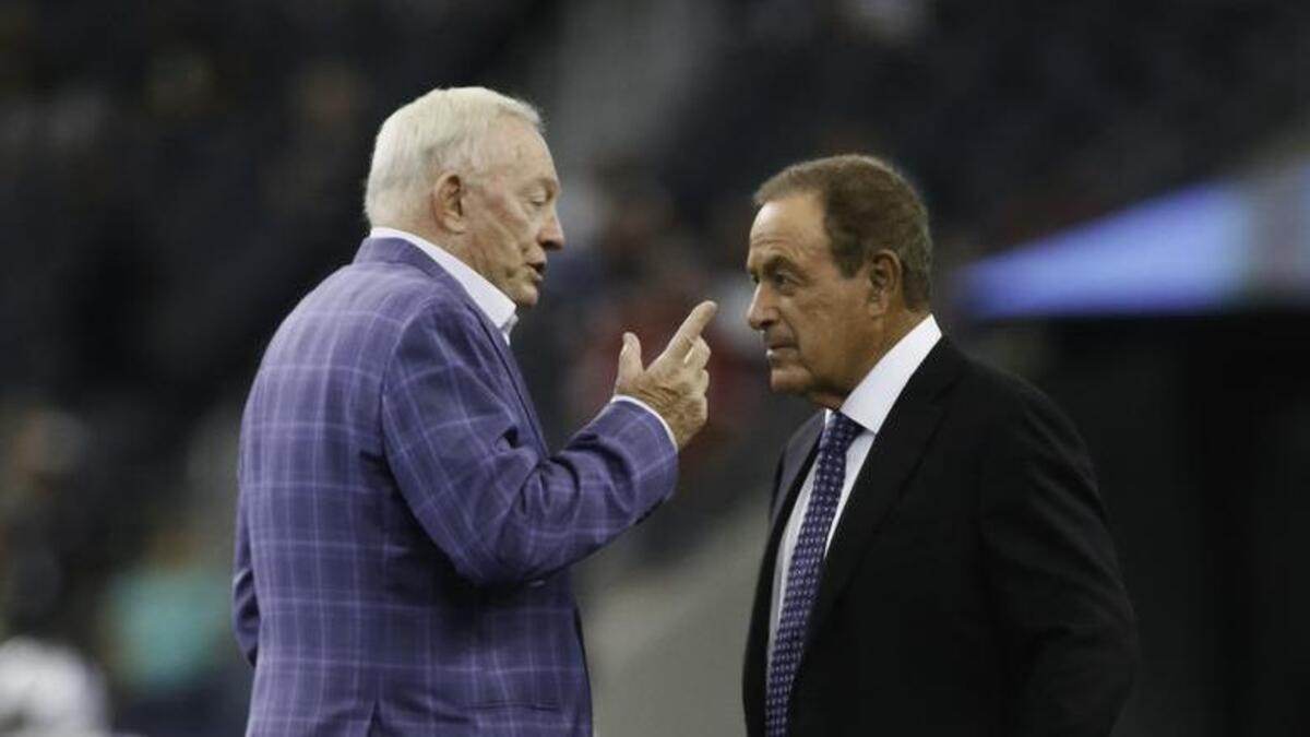 Dallas Cowboys owner Jerry Jones talks with Al Michaels of NBC Sports prior to a preseason NFL football game against the Arizona Cardinals on Sunday, August 26, 2018 at AT&T Stadium in Arlington, Texas. (Special to the Star-Telegram/Ray Carlin)