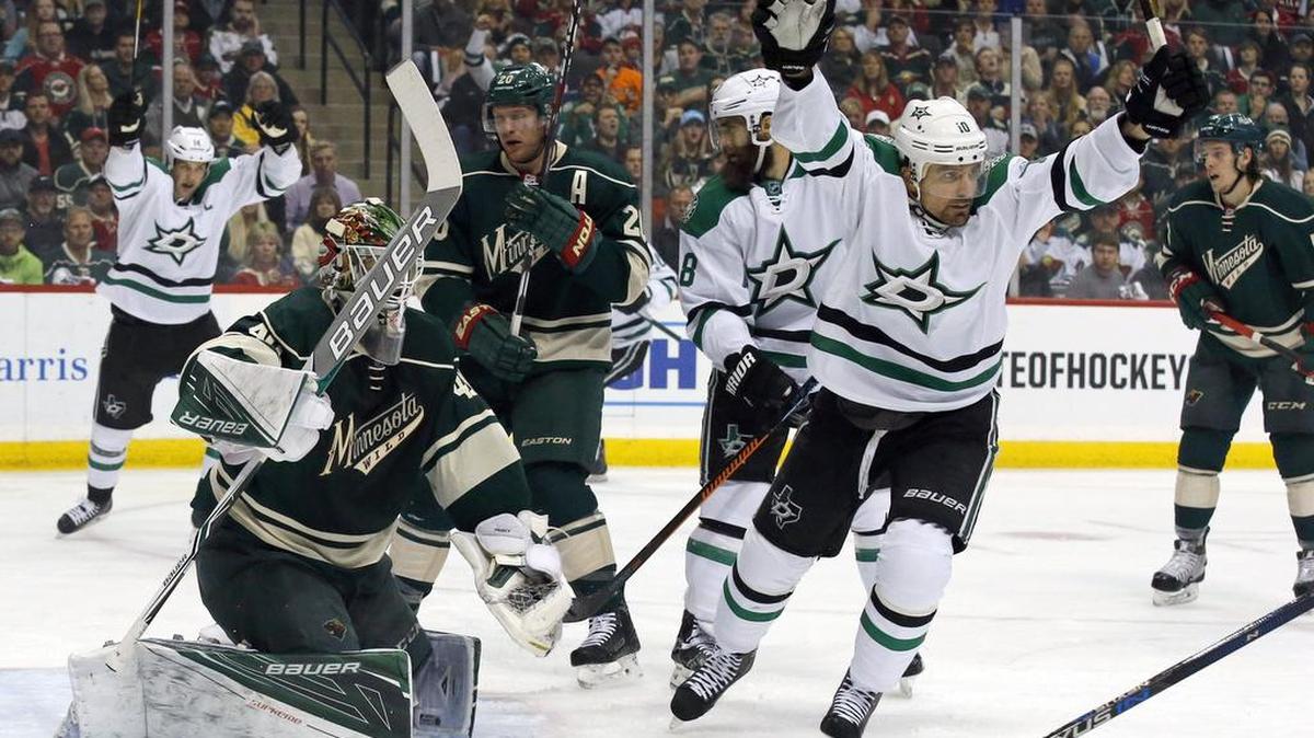 Left wing Patrick Sharp, right, celebrating a playoff goal last season against the Wild, hasn’t skated since sustaining a concussion on Oct. 20 and will miss the Dallas Stars’ first trip to Minnesota this season at 7 p.m. Saturday on Fox Sports Southwest.