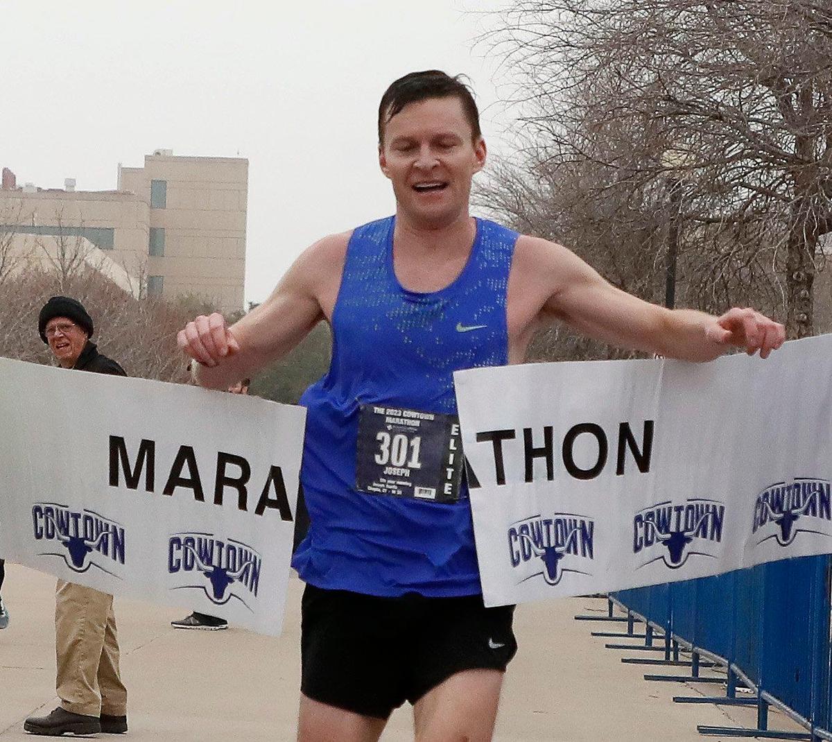 Joseph Darda took home first in the mens marathon with a time of 2:32.14 during the 2023 Cowtown Marathon in Fort Worth, Texas, Sunday, Feb. 26, 2023. Almost 21,000 runners registered for the two day event. (Special to the Star-Telegram Bob Booth)